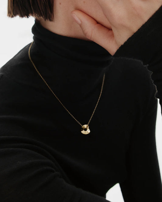 Alluring bronze pendant