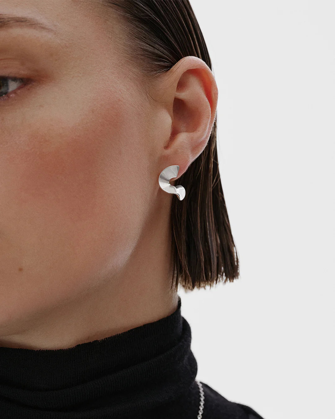 Alluring small silver earrings