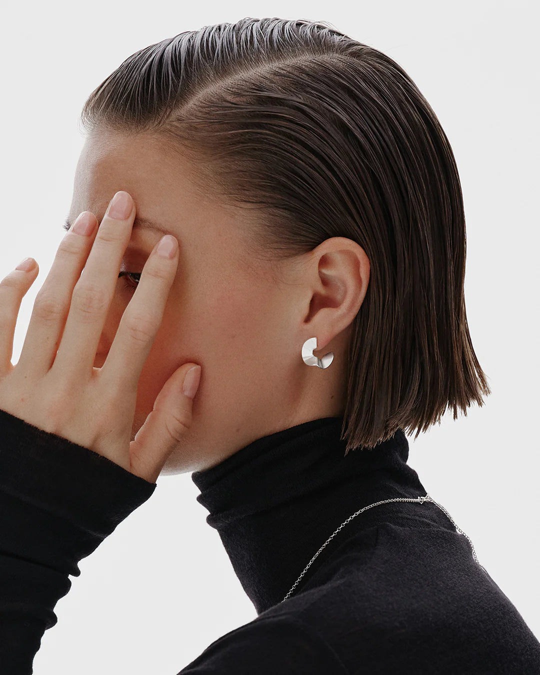 Alluring small silver earrings