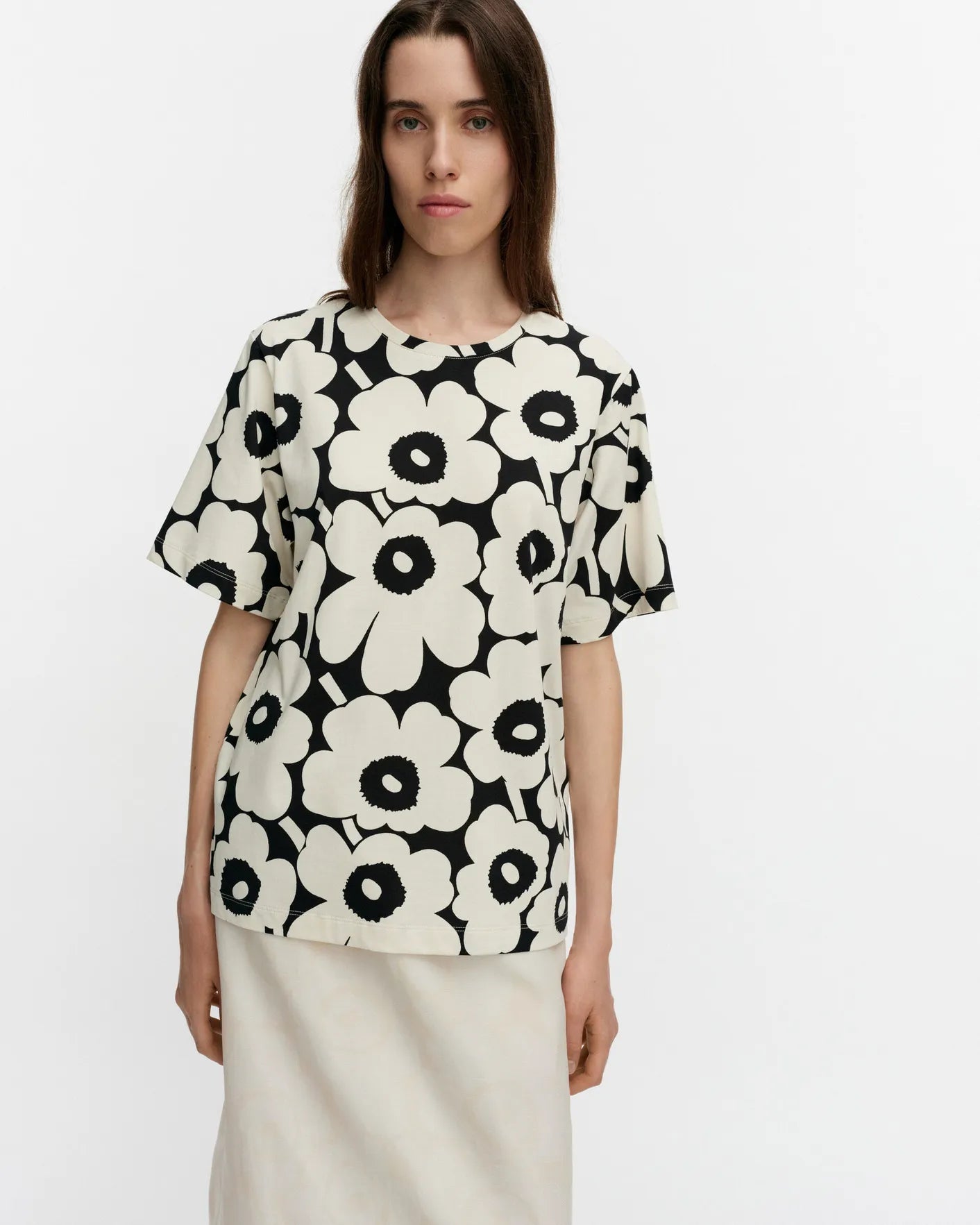 Tunnit Unikko T Shirt. Cream/black